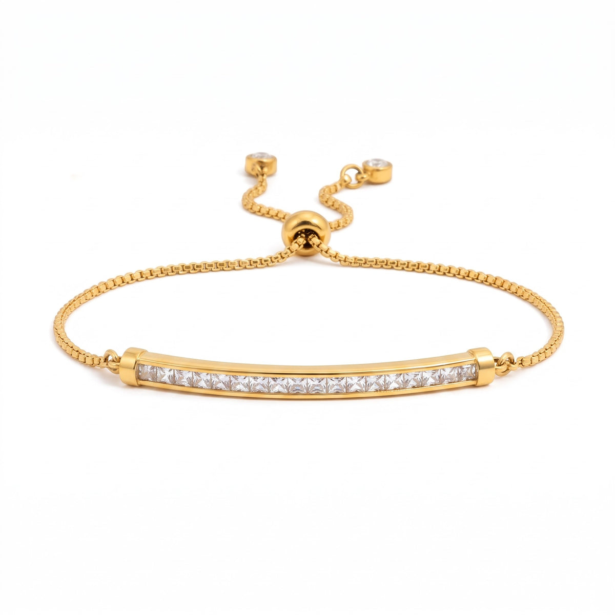 Meinara Amara gold-plated stainless steel bracelet with a crystal-set bar and adjustable sliding bolo closure.