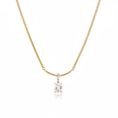 Meinara Aura gold necklace with a rectangular crystal drop pendant on a delicate stainless steel chain.