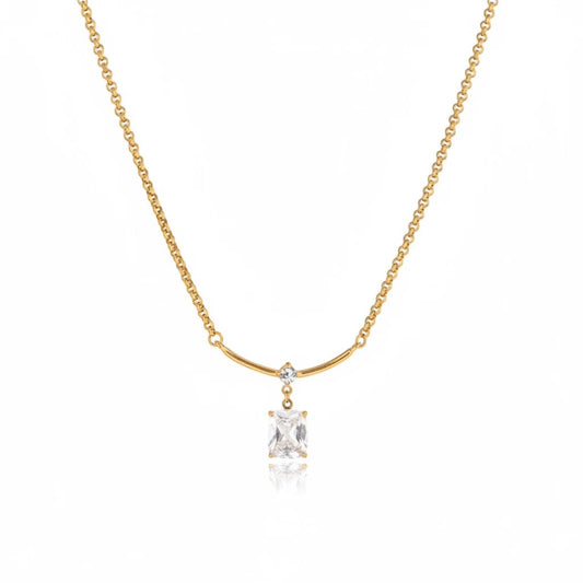 Meinara Aura gold necklace with a rectangular crystal drop pendant on a delicate stainless steel chain.