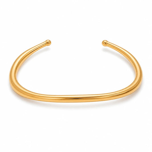 Meinara Aura Bangle in polished gold with a minimalist open cuff design and rounded ends.