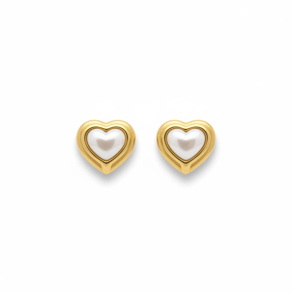 Meinara Cassi heart-shaped stud earrings featuring a white pearl center set in polished gold-tone metal