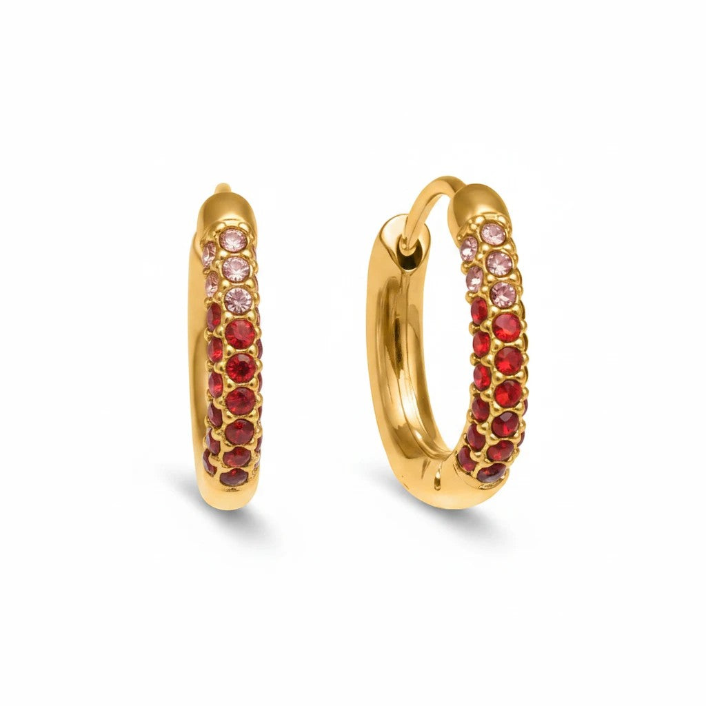Meinara Circa hoop earrings in 18k gold plated stainless steel with rows of vibrant red and pink crystal stones.