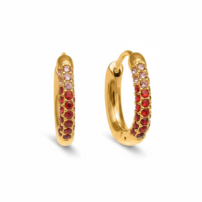Meinara Circa hoop earrings in 18k gold plated stainless steel with rows of vibrant red and pink crystal stones.