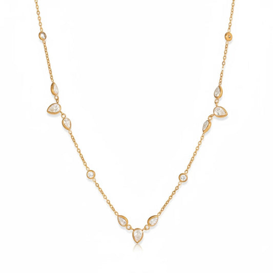 Meinara Elsi necklace featuring a delicate gold chain with pear-cut and round stones for an elegant, luminous look.