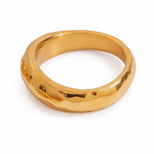 Meinara Ezra ring in 18k gold plated stainless steel with a polished, organic sculptural band design.