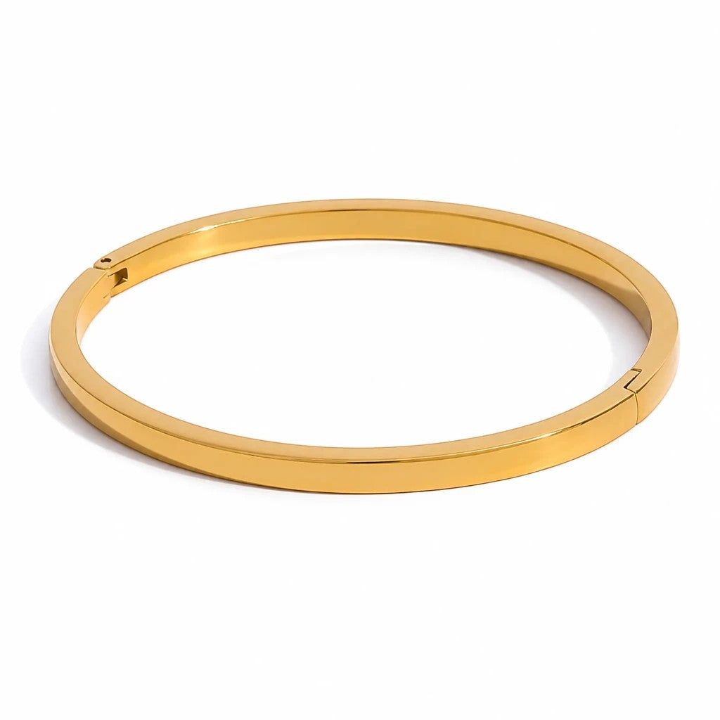 Meinara Halo Bangle in polished gold tone metal with a sleek minimalist hinged design