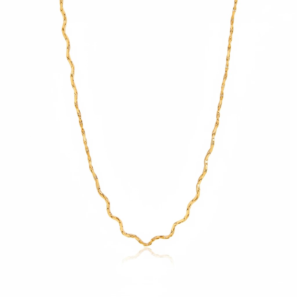 Meinara Kaia necklace featuring a delicate gold-toned chain with a unique wavy, serpentine link design.