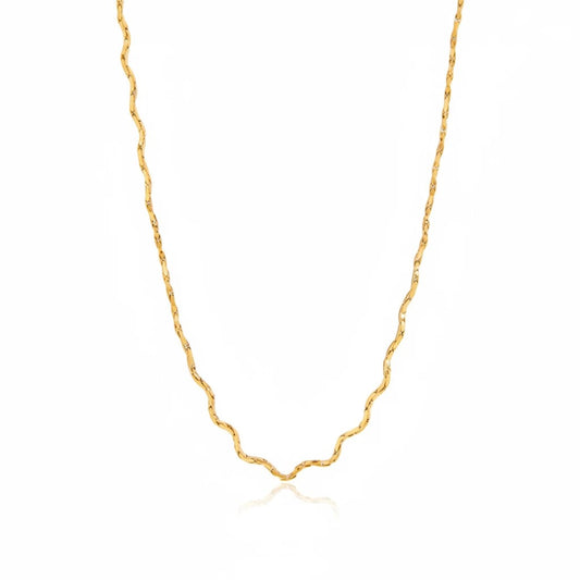 Meinara Kaia necklace featuring a delicate gold-toned chain with a unique wavy, serpentine link design.