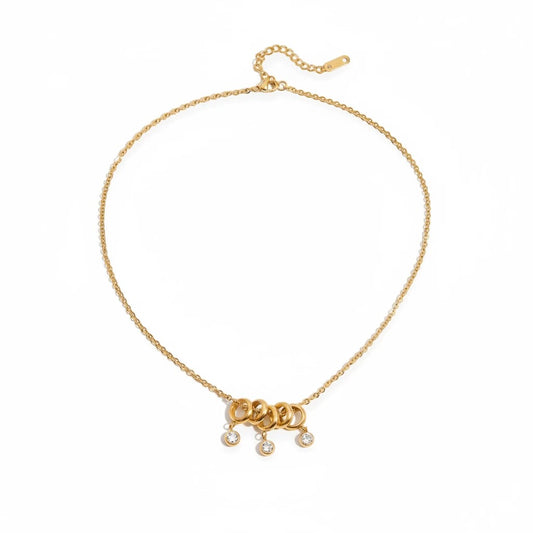 Meinara Lyra necklace in 18k gold plated stainless steel with interlocking rings and dangling crystal drops