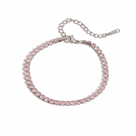 Meinara Muse bracelet featuring a delicate silver chain set with sparkling light pink crystals on a white background