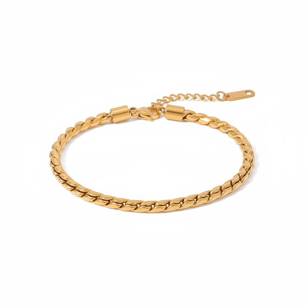Meinara Seren bracelet featuring a gold-toned twisted chain design with an adjustable clasp on a white background.