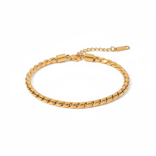 Meinara Seren bracelet featuring a gold-toned twisted chain design with an adjustable clasp on a white background.
